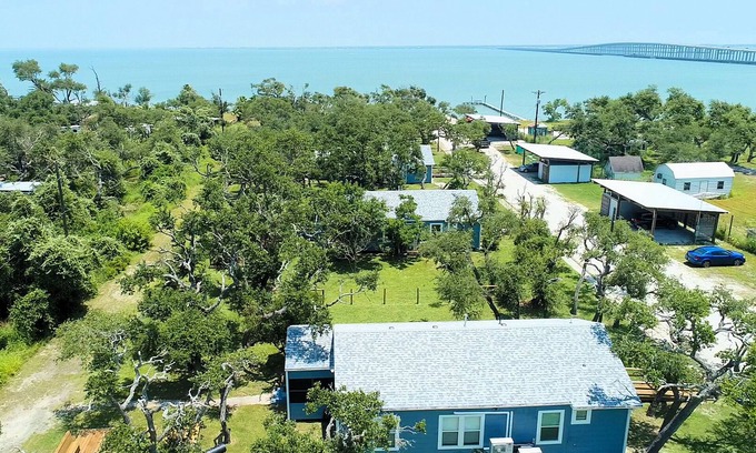 Rockport House | 3 bedroom 2 bath nestled in the oak trees right on Copano Bay! Private Pier!