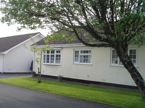 Scurlage House | 35 Gower Holiday Village with Seasonal Pool