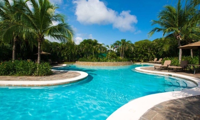Coco Condo | 3rd-floor Space with modern decor recently renovated viewing over pool in Coco