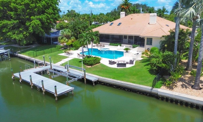 Saint Armands Key House | 4 BR/3 BA Lido Canal Home by FVC