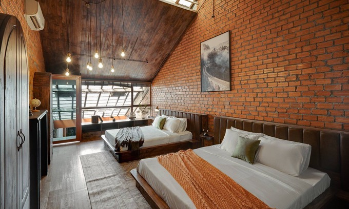 Downtown Ho Chi Minh City House | 4BR Industrial Gem with Rooftop Garden by Bến Thành