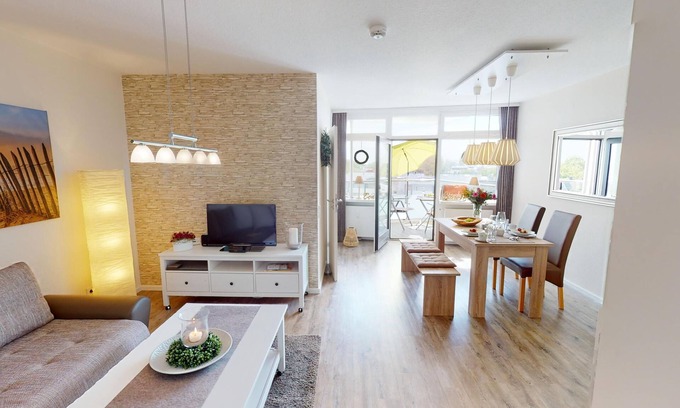 Pelzerhaken Apartment | 52 m² vacation apartment for up to 4 people with sea view, balcony, pool and sauna