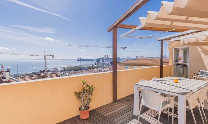 Santo Estevao Apartment | 70m2 Tagus River Terrace in Alfama By LovelyStay