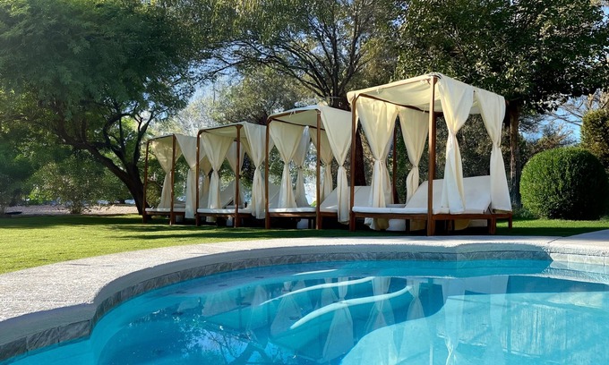 Paradise Springs Bed & Breakfast | 7x3 Villa, 10mins to the Strip, 16 seat dining table, pool + spa, RV parking.