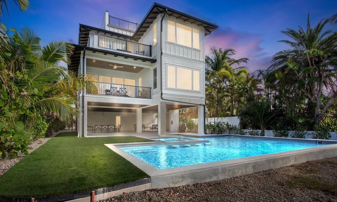 Saint Armands Key House | 9-Bedroom Waterfront Getaway, Steps from Lido Key Beach and St. Armands Circle!