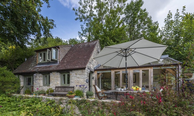 Upwey Cottage | A charming detached stone cottage situated on an elevated site above Upwey.