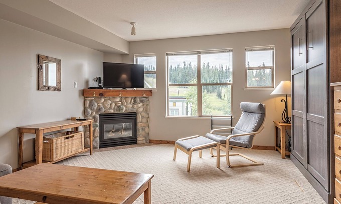 Silver Star Mountain Apartment | Affordable Fully Equipped Creekside Studio - Shared Hot Tub and Laundry