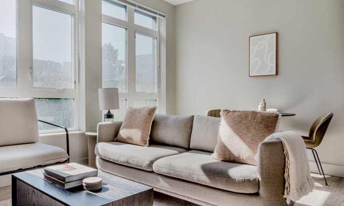 Squire Park Apartment | Airy First Hill Jr 1BR w/Gym, Roof Lounge, W/D & Games, by Blueground