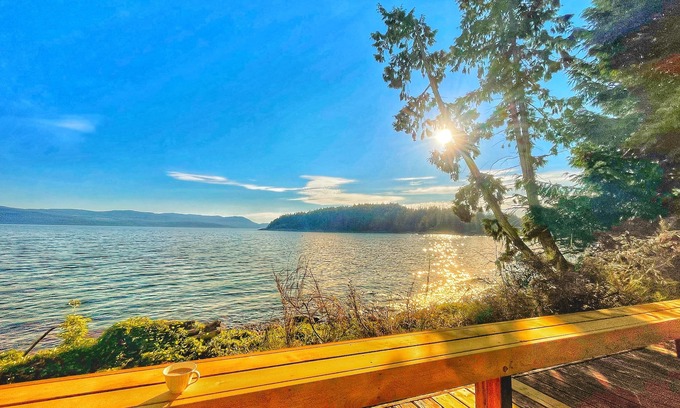 Stillwater House | Amazing Waterfront Retreat with two private decks, steps to beach
