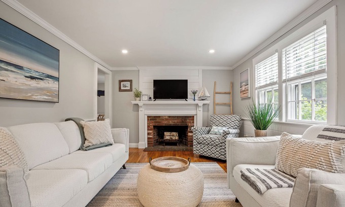 South Dennis House | An elevated Cape Cod escape close to coveted beaches with fully fenced yard, new deck and firepit
