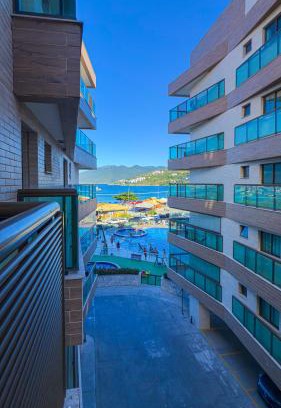 Praia Grande House | Apartamento Vista Mar e Piscina- Em Frente à Praia e Próximo a Restaurantes