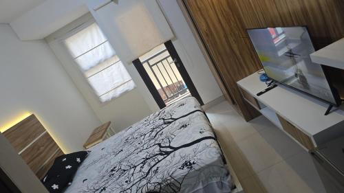 Depok Apartment | Apartemen Transpark by Lily's Room