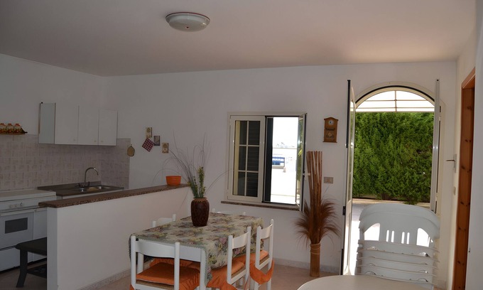 Marina di Novaglie Apartment | Apartment 'Alba Del Mare' with Sea View, Private Terrace and Shared Garden