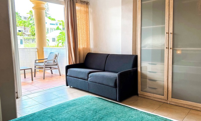 Anse des Rochers Apartment | Apartment in swimming pool and beach residence