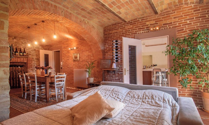 Barolo Apartment | Apartment in the center of Barolo with terrace and fireplace