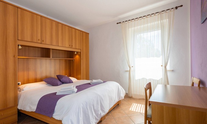 Rosignano Marittimo Apartment | Apartment 'Lavanda' with Shared Pool and Garden