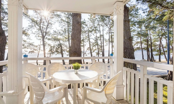 Fouesnant Apartment | Apartment 'La Cabine - Sea View on the Beach' with Sea View, Shared Pool and Wi-Fi