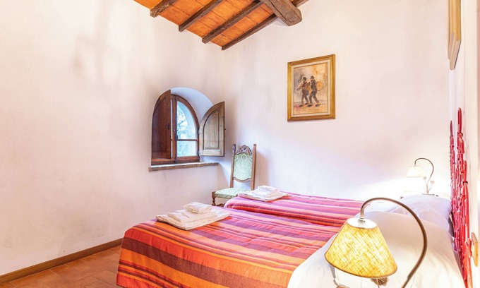 Santarello Apartment | Apartment 'La Capacciola - Ulivo' with Shared Pool, Private Terrace and Wi-Fi