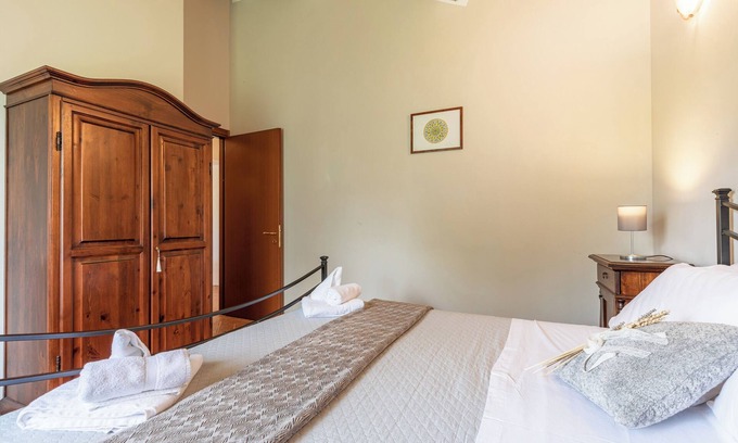 Chianciano Terme Apartment | Apartment 'La Loggia' with Mountain View, Shared Pool and Wi-Fi