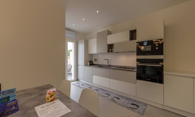 Golfo Aranci Apartment | Apartment "Rgsuite1" near Beach with Private Terrace & Wi-Fi