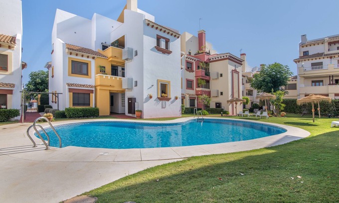 Costa Esuri Apartment | Apartment 'Saadia Golf and Beach' with Shared Pool, Wi-Fi and Air Conditioning
