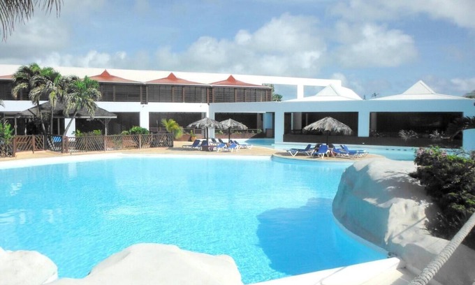 Saint-Francois Apartment | Apartment with SEA VIEW, swimming pool and beach 150m away