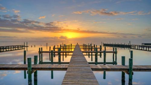 Flour Bluff House | Balcony w Bay View Shared Pool Boat Dock Fat Flounder by AvantStay