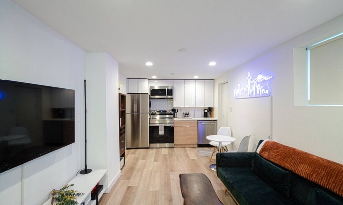 Mann Apartment | Basement Unit · The NEON Spot - Work station, KING bed