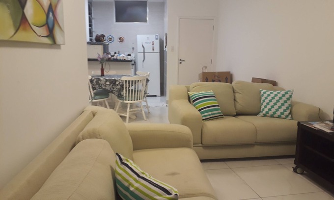 Pitangueiras Apartment | Beachfront apartment right on the sand.