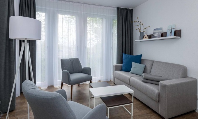 Bensersiel Apartment | Beachfront apartment with large balcony, parking, use of swimming pool & sauna -