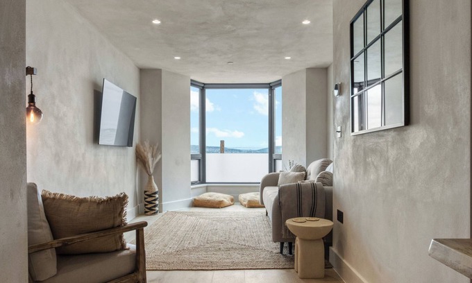 Mumbles Apartment | Beachfront eco-friendly apartment with ocean view and modern interior sleeping up to 6