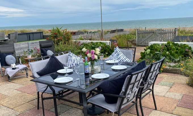 Pevensey House | Beachfront Getaway with Breathtaking Views & Family Comfort.