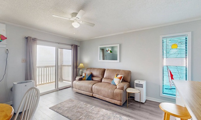 Sneads Ferry Condo | Beachfront condo with ocean views, balcony, WiFi, & shared grills