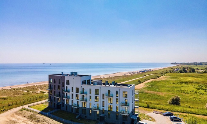 Olpenitz Apartment | "BeachTerraceTwo" vacation apartment on the beach with sun terrace, sauna & sea view