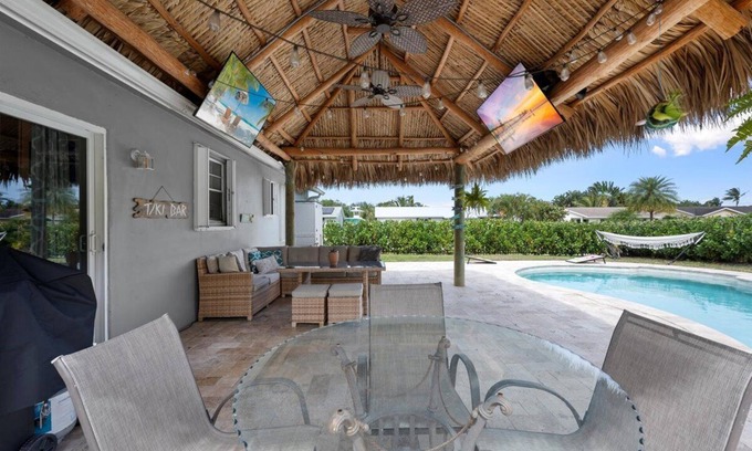 Jupiter House | Beachy Chic Bungalow - Pool Home with Tiki Hut Located in the Heart of Jupiter