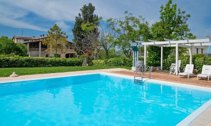 Citta Sant'Angelo Apartment | Beautiful apartment for 4 guests with A/C, WIFI, pool, TV, patio and pets allowed