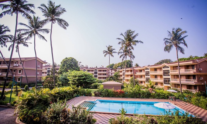 Candolim Apartment | Beautiful Apartment in Regal Park, Candolim, Goa with Pool and Garden Views