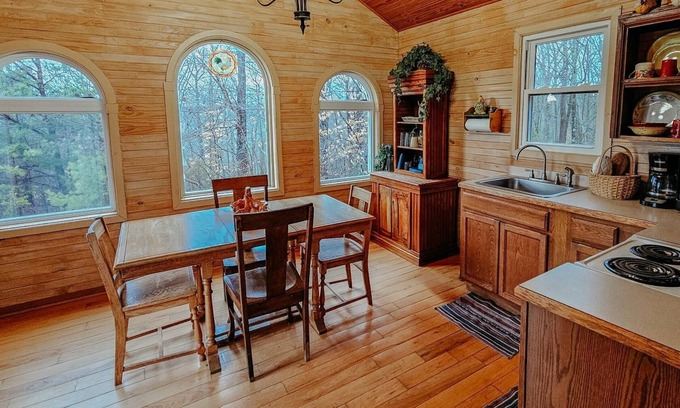 Beattyville Cabin | Beautiful, authentic log cabin with acres of land, fishing pond, and hot tub.