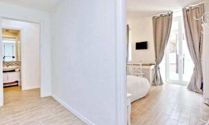 Vatican Apartment | Beautiful double bedroom with garden