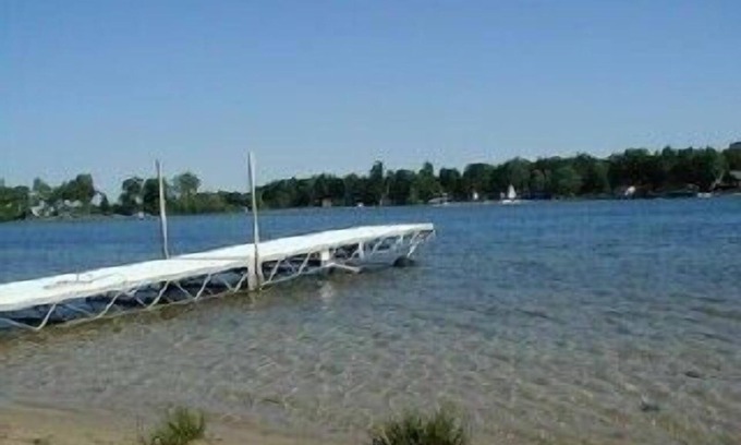 Twin Lake House | Beautiful Lake Front Home with Private Dock.