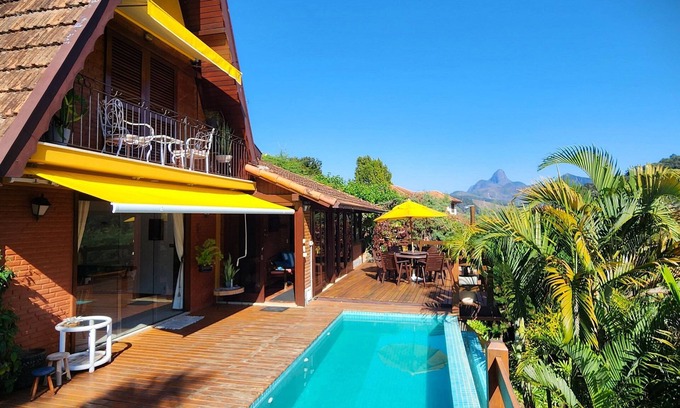 Itaipava House | Beautiful mountain house with 4 bedrooms, a/c, heated pool in Itaipava, Petrópolis