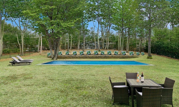 Noyack House | Beautiful Peconic Bay home with water views, private pool, wraparound front...