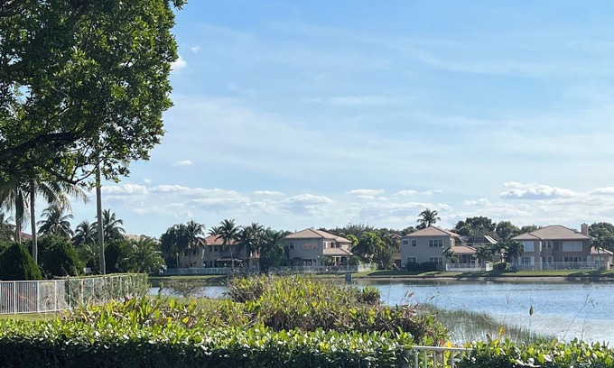 Lake Worth House | Beautiful two story Spacious 5-bedroom house with water views and pool & gym