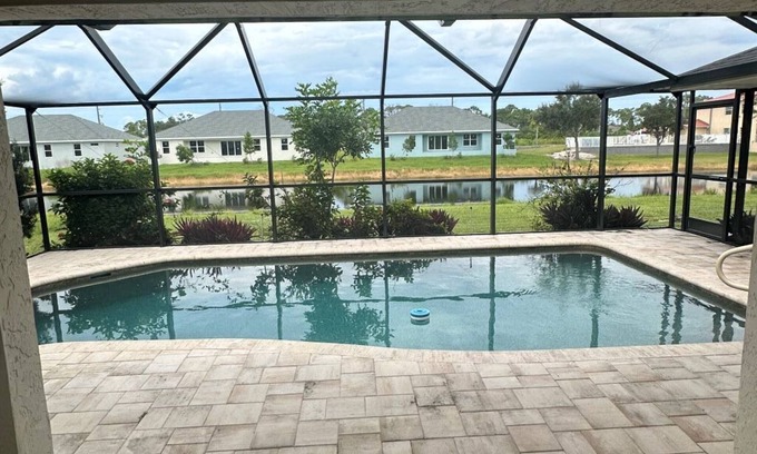 Pebble Beach House | Beautifully updated waterfront 3-bedroom house with heated pool in Rotonda West.