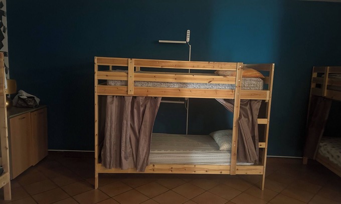 Busto Garolfo House | Beds in shared room