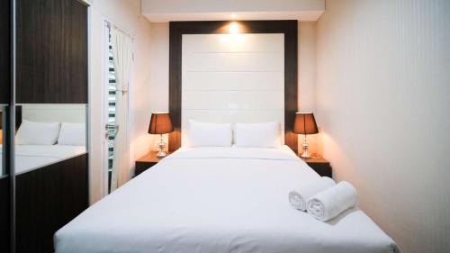 Surabaya Apartment | Best Location and Tidy 2BR Apartment at Trillium Residence By Travelio