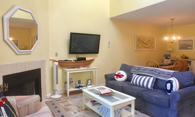 Brewster Condo | Billington townhouse with straight staircase that leads to an enclosed loft, premium streaming TV.