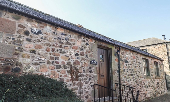 Akeld House | BIZZIE LIZZIE, pet friendly, with pool in Wooler