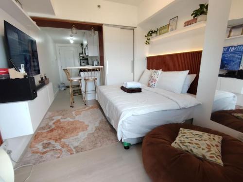 San Fernando Apartment | BLissfully BAli18 at Azure North Residences