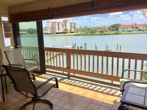 Indian Shores Apartment | Blue Haven Condo - Waterfront, Heated Pool, Bay